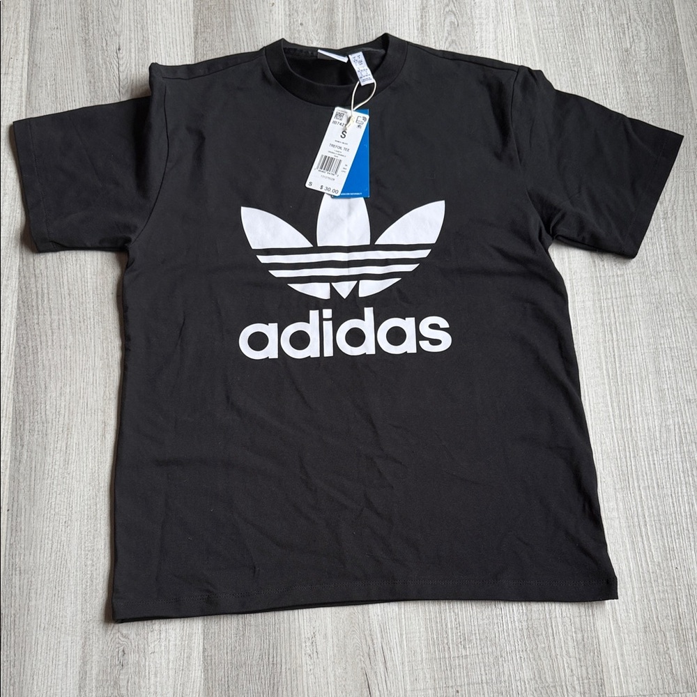 Adidas Men's Black Tee with White Logo. CAJA. #. 2 โ A